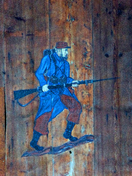 Fresque d'un poilu du 152 RI sur une grange à Niffer en Alsace