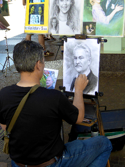 Portraitiste de rue à Freiburg im Breisgau - Allemagne